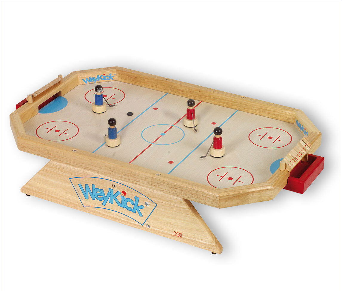 Hockeyspiel mit vier Spielfiguren auf einem Holztisch, markierte Spielfläche, Tor und Spielregler.