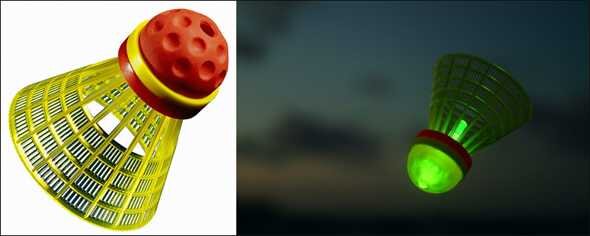 Schläger mit gelbem Rahmen und rotem Kopf, leuchtet grün im Dunkeln.