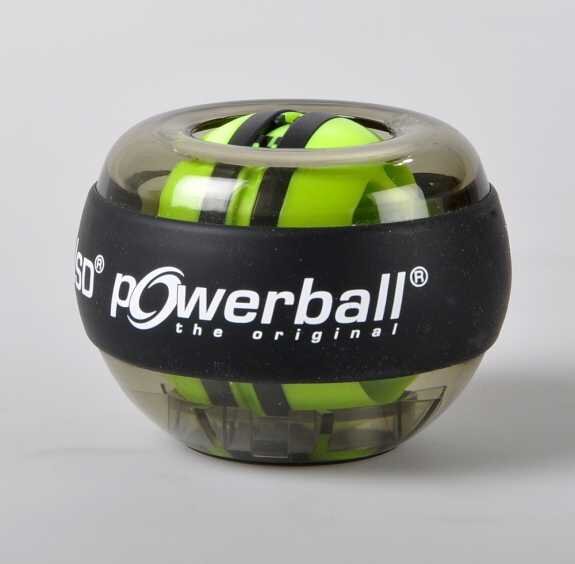 Kugel mit grünen und schwarzen Powerballs in einer transparenten und schwarzen Verpackung.