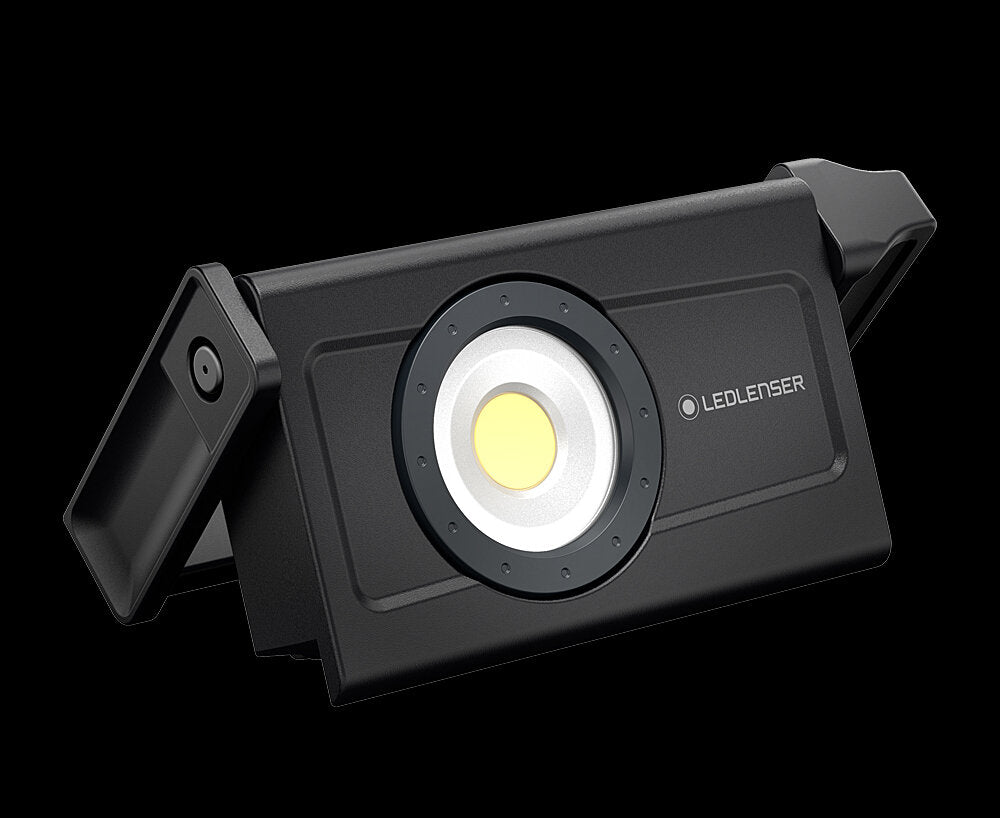 Tragbare LED-Lampe mit flexiblem Clip, schwarzes Gehäuse, runder Lichtkopf, Marke "LEDLENSER".