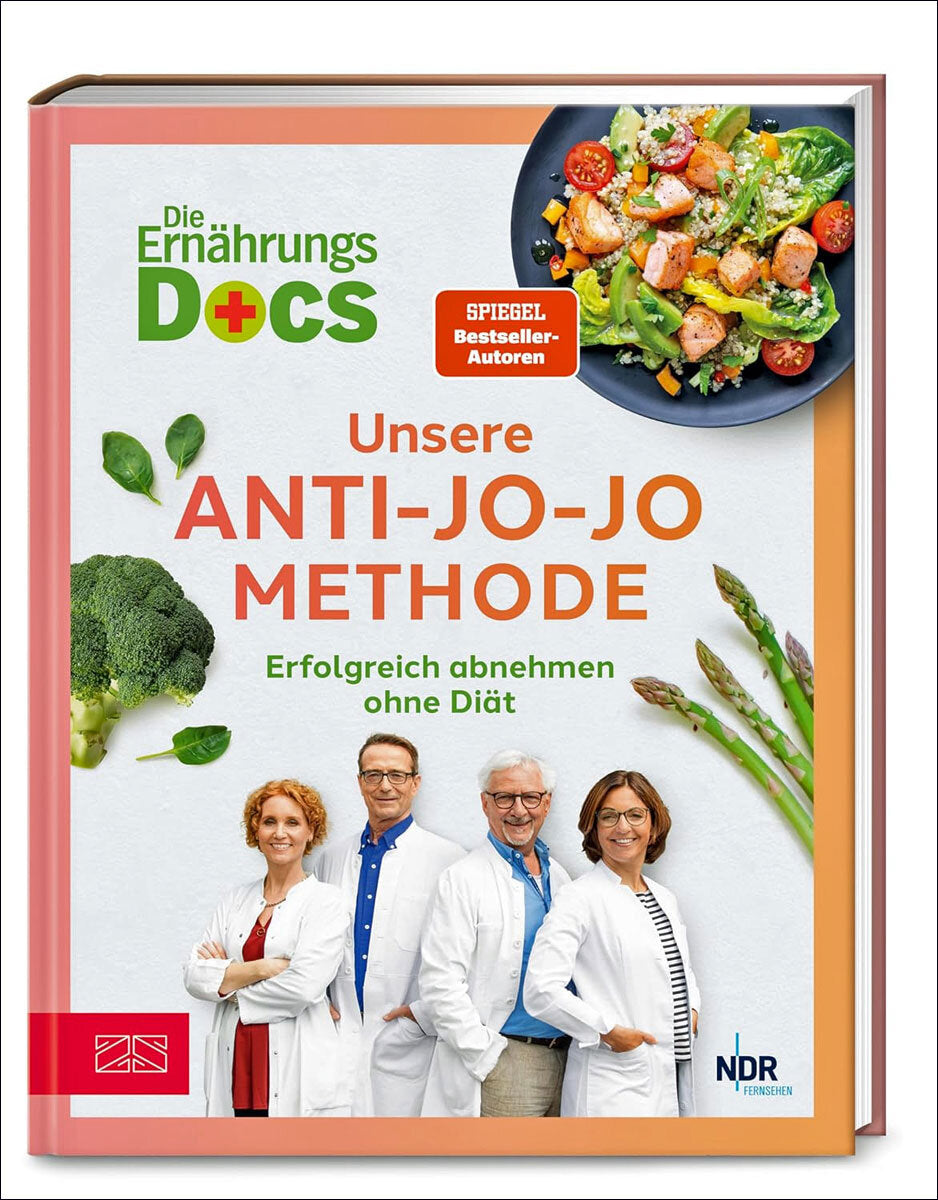 Buchcover mit Titel, vier Personen in weißen Kitteln, Salat, Brokkoli, Spargel, und einem Teller mit Salat.