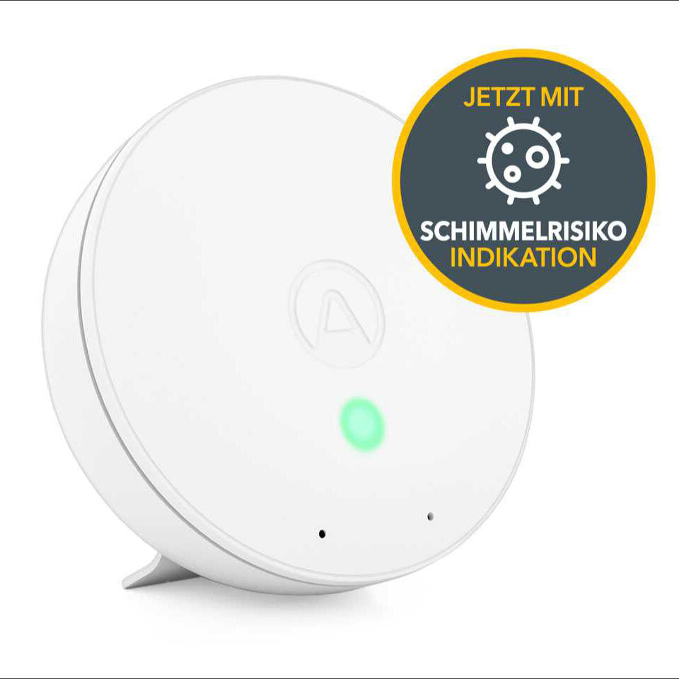 Rauchmelder mit grünem Kontrolllicht und Aufkleber "Jetzt mit Schimmelrisiko-Indikation".