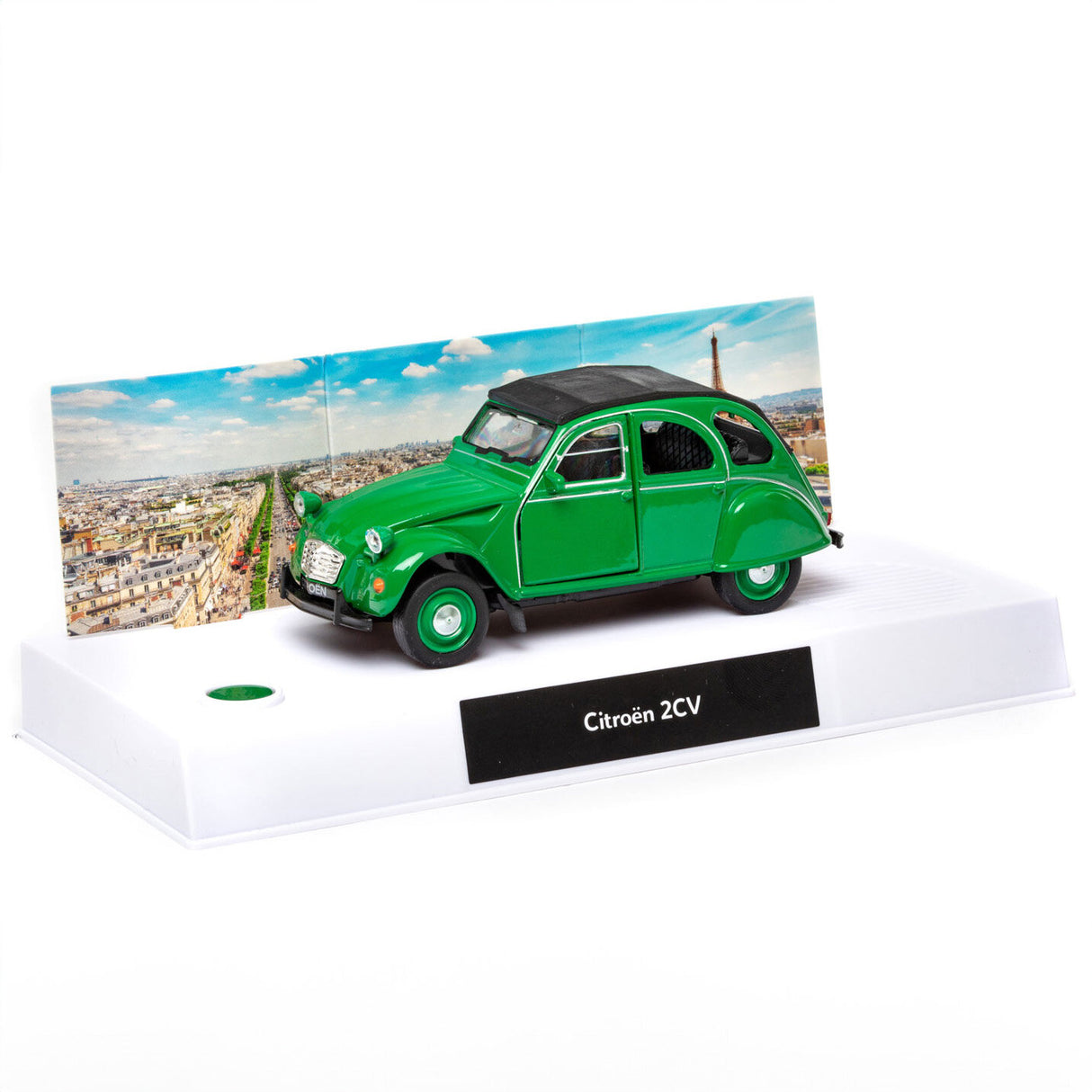 Kleiner grüner Citroën 2CV Modellauto mit Paris-Hintergrund auf Display.