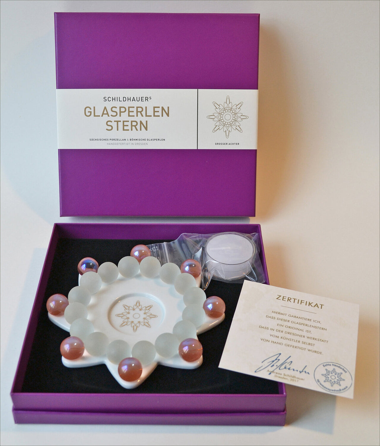 Dresdner Glasperlenstern. Großer Achter rosé-weiß