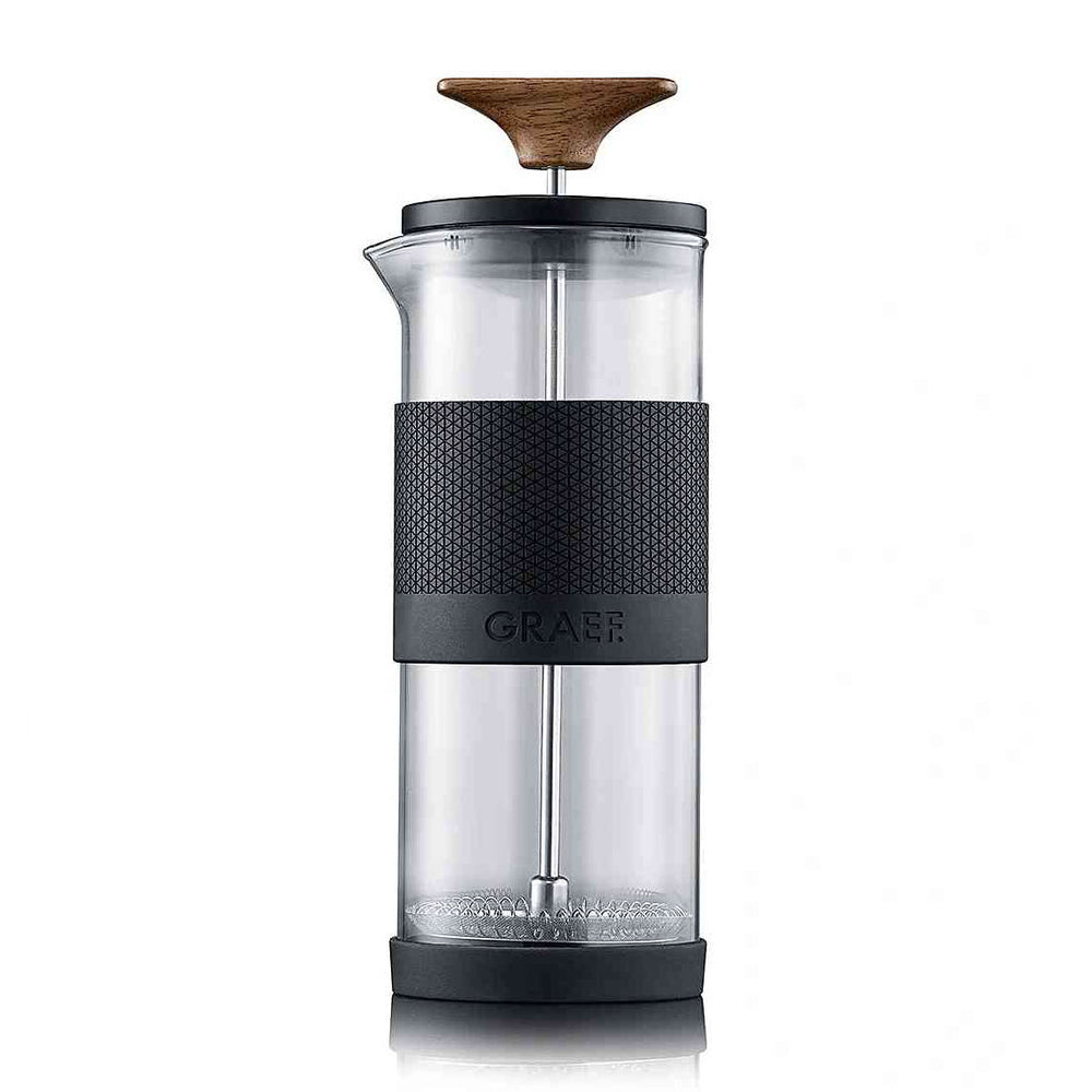 Kaffeemühle mit Holzgriff, Glasbehälter, schwarzem Gummiband mit Muster und "GRAEF"-Schrift.
