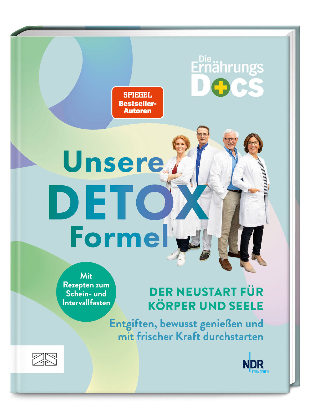 Buchcover mit Titel "Unsere Detox Formel" und vier Personen in weißen Kitteln, die lächelnd in die Kamera schauen.