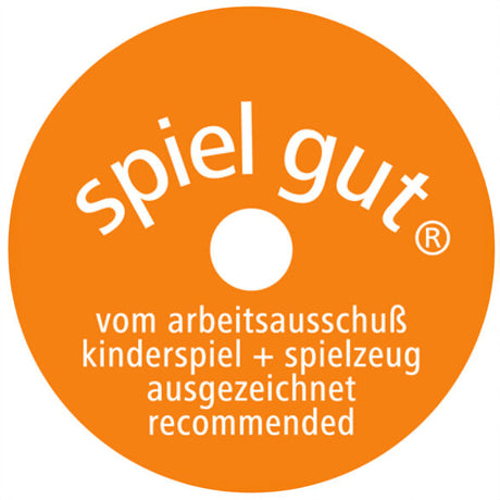 Orangener runder Aufkleber mit weißem Text, der "spiel gut" und weitere Informationen über Auszeichnung für Kinderspielzeug