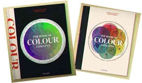 Zwei Bücher mit dem Titel "The Book of Colour Concepts" liegen nebeneinander, eines mit schwarzem und eines mit weißem Cover.