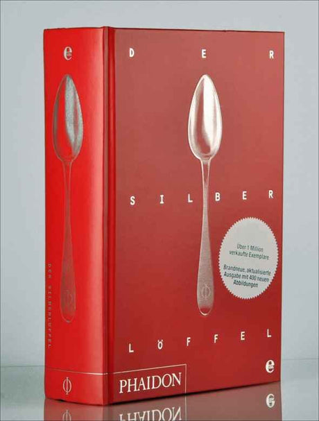 Buch mit rotem Cover, silberner Löffel auf Vorder- und Rückseite, Titel "Der Silber Löffel", Phaidon Verlag.