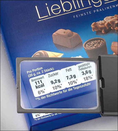 Blick auf eine Nährwerttabelle auf einer Schachtel Liebherr Pralinen, mit Angaben zu Kalorien, Zucker, Fett