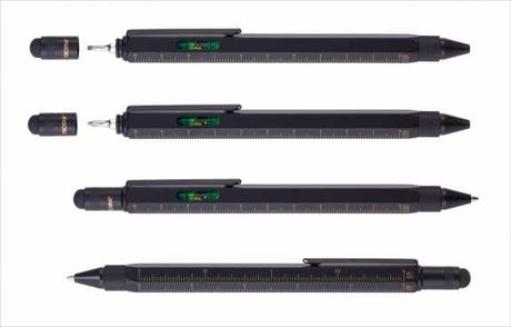 Vier schwarze Filzstifte mit unterschiedlichen Spitzen, jeweils mit Clip und grüner Libelle auf der Seite.