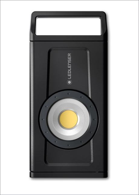 Schwarze LED-Taschenlampe mit rechteckigem Griff und runder Lichtquelle.
