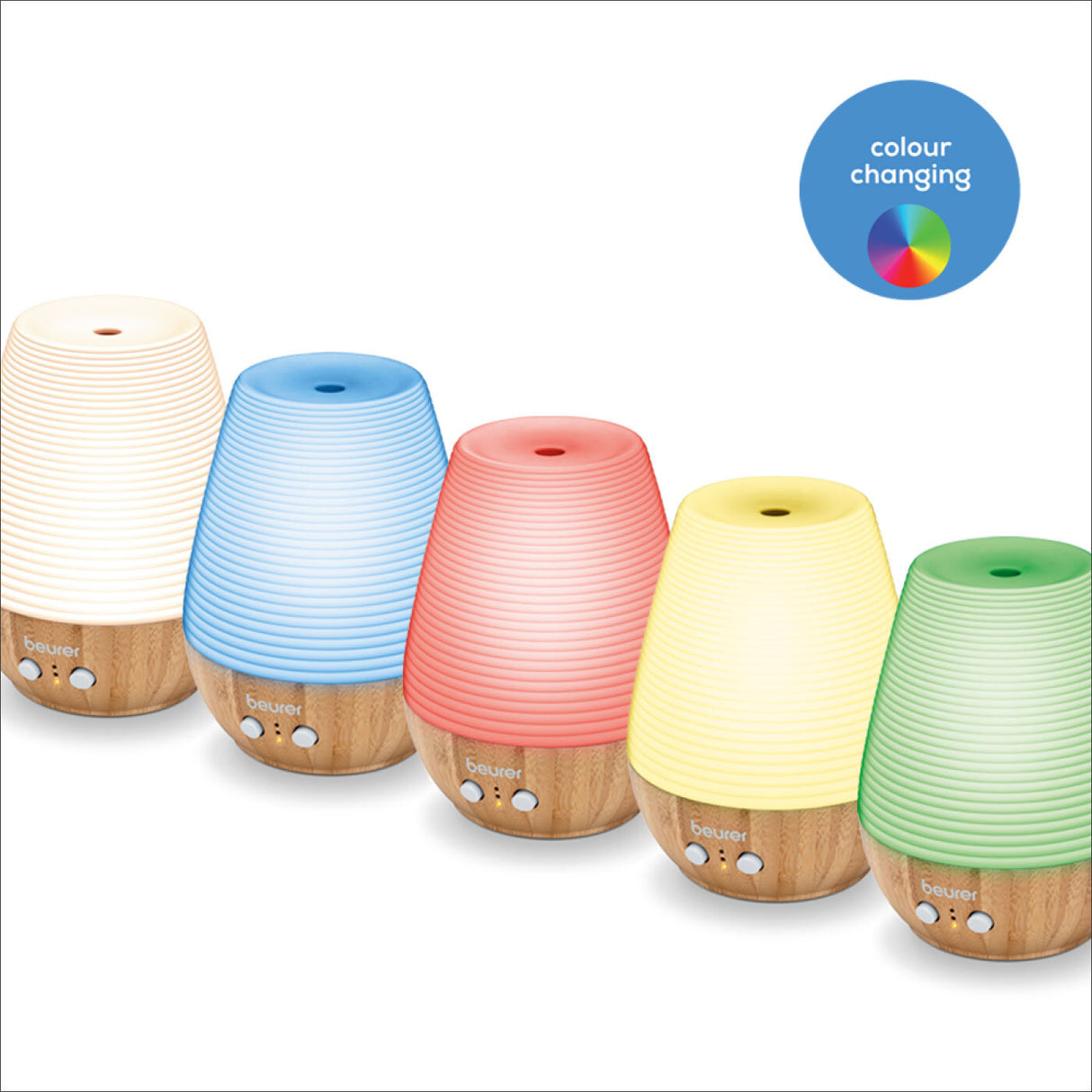 Fünf Farbwechsel-Diffusoren in Beige, Blau, Rot, Gelb und Grün, mit Holzbasis und Steuerknöpfen.