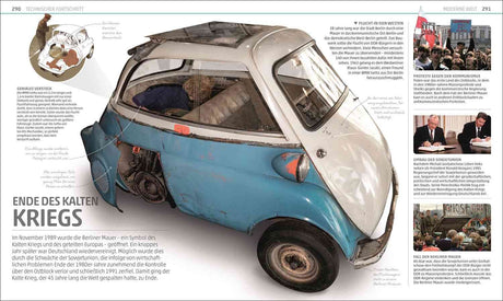 Ein alter, blauer und weißer Miniatur-Transporter mit sichtbaren Roststellen und offenem Motorraum.