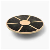 Rundes Holzbrett mit schwarzen Segmente und beige Linien, auf weißem Hintergrund.