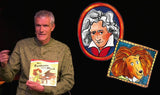 Mann hält Buch "Herr Beethoven macht Musik" vor sich, im Hintergrund Porträts von Beethoven und Leo Lionni.