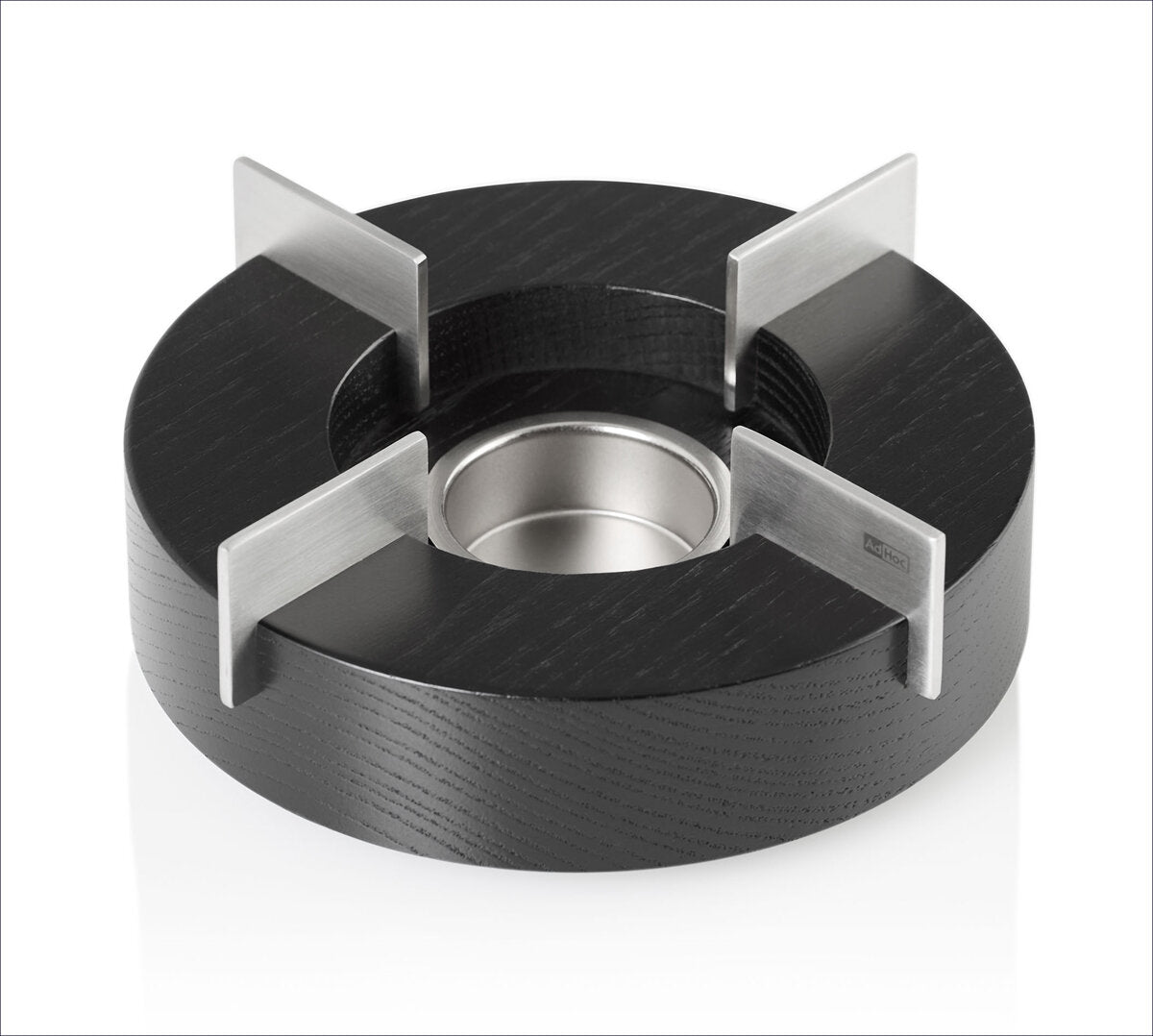 Runder schwarzer Gummiring mit vier Metallstegen und zentralem Metalllager.