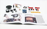 Elektronikbauteile, Lautsprecher, Kabel, Platine, LEDs, Widerstände, Schrauben, Anleitung auf offener Zeitschrift.
