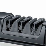 Mehrere schwarze Klammern mit Nummern 1, 2, 3 in einem schwarzen Kunststoffhalter.