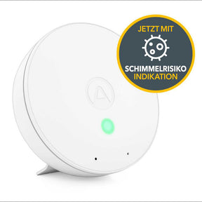 Rauchmelder mit grünem Kontrolllicht und Aufkleber "Jetzt mit Schimmelrisiko-Indikation".