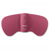 Rotes, ergonomisch geformtes Gerät mit Beurer-Logo, mit Pfeil- und Symbolen auf der Oberseite.