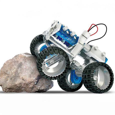 Ein Roboter mit großen Rädern klettert über einen Felsen.