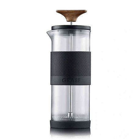 Kaffeemühle mit Holzgriff, Glasbehälter, schwarzem Gummiband mit Muster und "GRAEF"-Schrift.