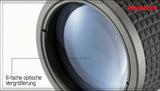 Nahaufnahme eines Objektivs mit 6-facher optischer Vergrößerung, Teil eines Minox-Geräts.